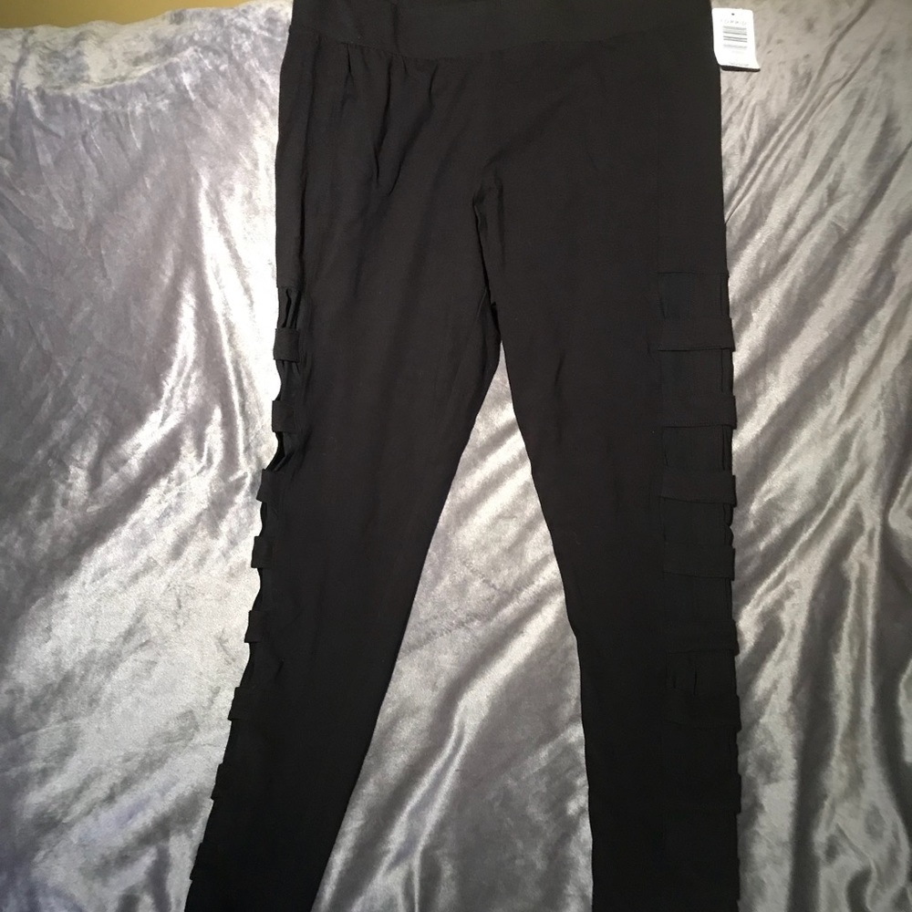 Black leggings with lattice mesh down leg on side